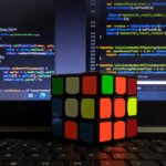 Rubik’s Cube with code background